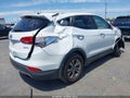 2016 Hyundai Santa Fe — photo 4 of 19 | VIN 5XYZU3LB6GG336508