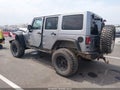 2013 Jeep Wrangler Unlimited — photo 3 of 16 | VIN 1C4BJWFGXDL574655