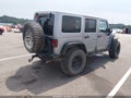 2013 Jeep Wrangler Unlimited — photo 4 of 16 | VIN 1C4BJWFGXDL574655