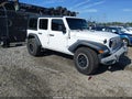 2018 Jeep Wrangler Unlimited — photo 1 of 16 | VIN 1C4HJXDN7JW250039