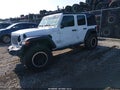 2018 Jeep Wrangler Unlimited — photo 2 of 16 | VIN 1C4HJXDN7JW250039