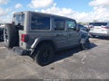 2021 Jeep Wrangler Unlimited — photo 4 of 16 | VIN 1C4HJXDM6MW599477