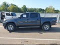 2011 Toyota Tacoma — photo 14 of 18 | VIN 3TMJU4GN1BM118821