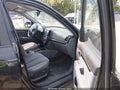 2010 Hyundai Santa Fe — photo 5 of 18 | VIN 5NMSH4AG2AH397684