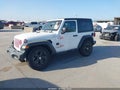 2020 Jeep Wrangler — photo 2 of 16 | VIN 1C4GJXAN4LW228096