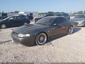 2004 Ford Mustang — photo 2 of 14 | VIN 1FAFP42RX4F202569