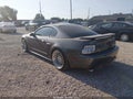 2004 Ford Mustang — photo 3 of 14 | VIN 1FAFP42RX4F202569