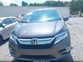 2018 Honda Odyssey — photo 12 of 16 | VIN 5FNRL6H95JB098157