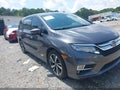2018 Honda Odyssey — photo 1 of 16 | VIN 5FNRL6H95JB098157