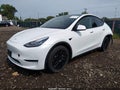 2022 Tesla Model Y — photo 2 of 20 | VIN 7SAYGDEE1NF332650