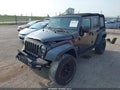 2016 Jeep Wrangler Unlimited — photo 2 of 17 | VIN 1C4BJWDG2GL263518
