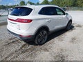 2015 Lincoln MKC — photo 4 of 16 | VIN 5LMTJ2AH3FUJ40709