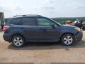 2014 Subaru Forester — photo 14 of 18 | VIN JF2SJAPC4EH516111