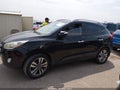 2015 Hyundai Tucson — photo 14 of 16 | VIN KM8JUCAG8FU090811