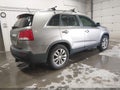 2011 Kia Sorento — photo 4 of 12 | VIN 5XYKUDA26BG044313