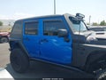 2016 Jeep Wrangler Unlimited — photo 13 of 17 | VIN 1C4BJWDG1GL215315