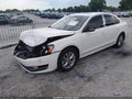 2014 Volkswagen Passat — photo 2 of 16 | VIN 1VWCS7A3XEC074196