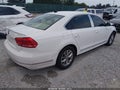 2014 Volkswagen Passat — photo 4 of 16 | VIN 1VWCS7A3XEC074196