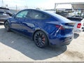 2022 Tesla Model Y — photo 3 of 18 | VIN 7SAYGDEF2NF491542