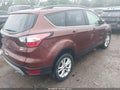 2018 Ford Escape — photo 4 of 16 | VIN 1FMCU9GD6JUA96429