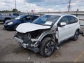 2015 Honda CR-V — photo 2 of 16 | VIN 5J6RM4H94FL067398