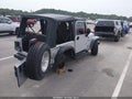 2004 Jeep Wrangler — photo 4 of 17 | VIN 1J4FA39S44P749176
