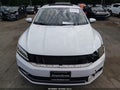 2017 Volkswagen Passat — photo 12 of 17 | VIN 1VWGT7A30HC005181