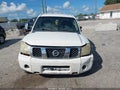 2004 Nissan Titan — photo 12 of 16 | VIN 1N6AA07AX4N549694