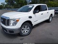 2017 Nissan Titan — photo 2 of 17 | VIN 1N6AA1EJ3HN574404