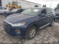 2019 Hyundai Santa Fe — photo 2 of 16 | VIN 5NMS3CAD9KH086107