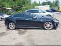 2015 Tesla Model S — photo 11 of 14 | VIN 5YJSA1E40FF116185
