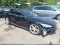 2015 Tesla Model S — photo 1 of 14 | VIN 5YJSA1E40FF116185