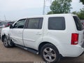 2015 Honda Pilot — photo 13 of 15 | VIN 5FNYF3H7XFB025681