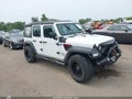 2018 Jeep Wrangler Unlimited — photo 1 of 16 | VIN 1C4HJXDN1JW196768
