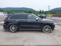 2014 Jeep Grand Cherokee — photo 13 of 16 | VIN 1C4RJFJG4EC338090