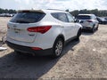2015 Hyundai Santa Fe — photo 4 of 19 | VIN 5XYZWDLA6FG264991