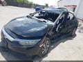 2016 Honda Civic — photo 2 of 11 | VIN 2HGFC2F70GH552350