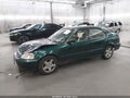 1999 Honda Civic — photo 2 of 16 | VIN 2HGEJ6676XH554192