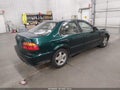 1999 Honda Civic — photo 4 of 16 | VIN 2HGEJ6676XH554192
