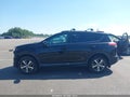2018 Toyota RAV4 — photo 15 of 17 | VIN 2T3RFREV4JW793184