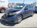2014 Honda CR-V — photo 2 of 17 | VIN 3CZRM3H37EG712319