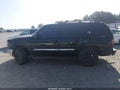 2003 GMC Yukon — photo 14 of 16 | VIN 1GKEK13T23J186056