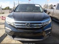 2016 Honda Pilot — photo 13 of 17 | VIN 5FNYF5H15GB014404