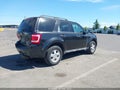 2011 Ford Escape — photo 4 of 18 | VIN 1FMCU0D76BKA08244