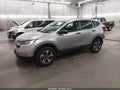 2018 Honda CR-V — photo 2 of 17 | VIN 2HKRW6H36JH209755