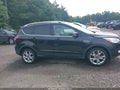 2015 Ford Escape — photo 13 of 16 | VIN 1FMCU9J95FUA56600