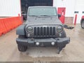 2016 Jeep Wrangler Unlimited — photo 13 of 17 | VIN 1C4BJWFG8GL295516