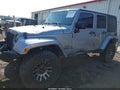 2014 Jeep Wrangler Unlimited — photo 14 of 15 | VIN 1C4BJWEG0EL173425
