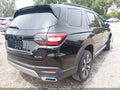 2023 Honda Pilot — photo 4 of 17 | VIN 5FNYG1H87PB019641