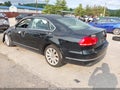 2015 Volkswagen Passat — photo 3 of 16 | VIN 1VWCV7A37FC034943